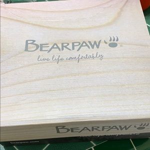 Bearpaw boots burgundy colored.